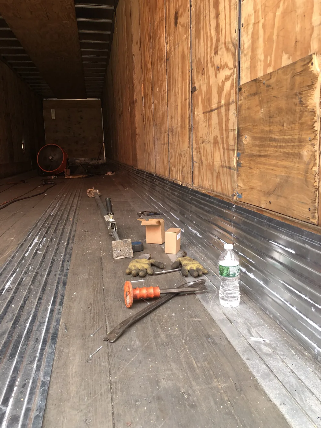 Tools on the floor inside a trailer