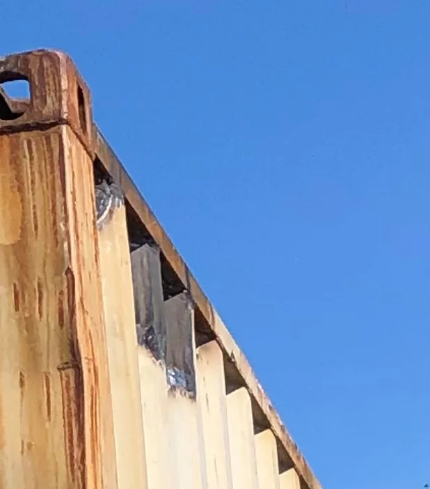 Damaged edge of a truck body